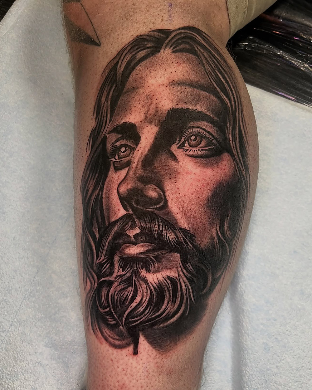 Portrait of Christ in black and grey, by Owen Lewis